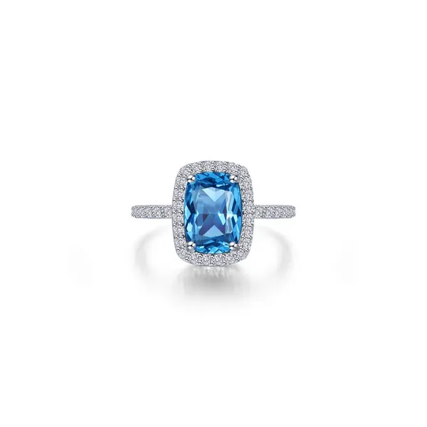 7, SS Simulated Blue Topaz Halo Ring Vaughan's Jewelry Edenton, NC