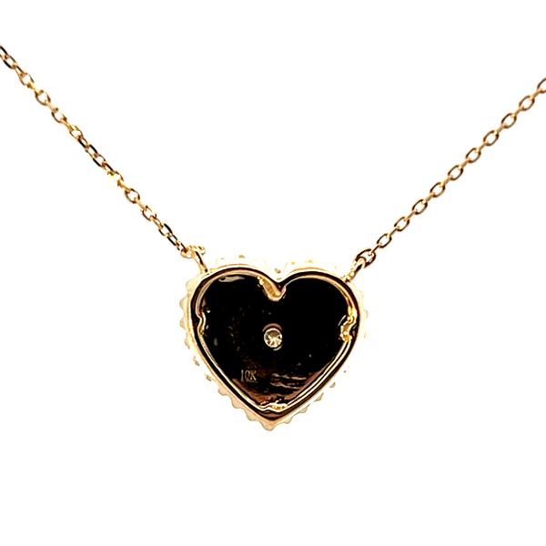 Lady's Yellow 10 Karat Starburst Heart Pendant with Round Diamonds Image 3 Venus Jewelers Somerset, NJ