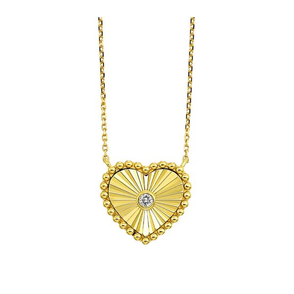 Lady's Yellow 10 Karat Starburst Heart Pendant with Round Diamonds Venus Jewelers Somerset, NJ