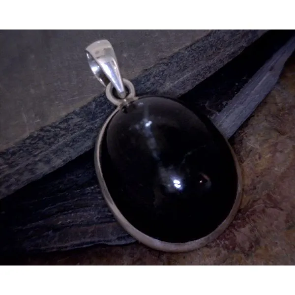 silver pendant  Vulcan's Forge LLC KANSAS CITY, MO