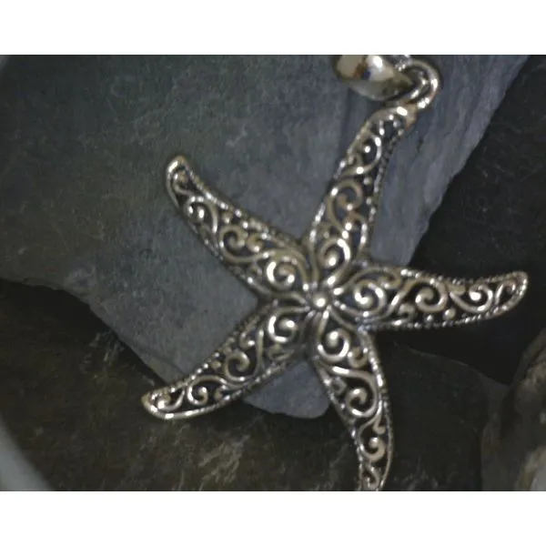 silver pendant  Vulcan's Forge LLC KANSAS CITY, MO