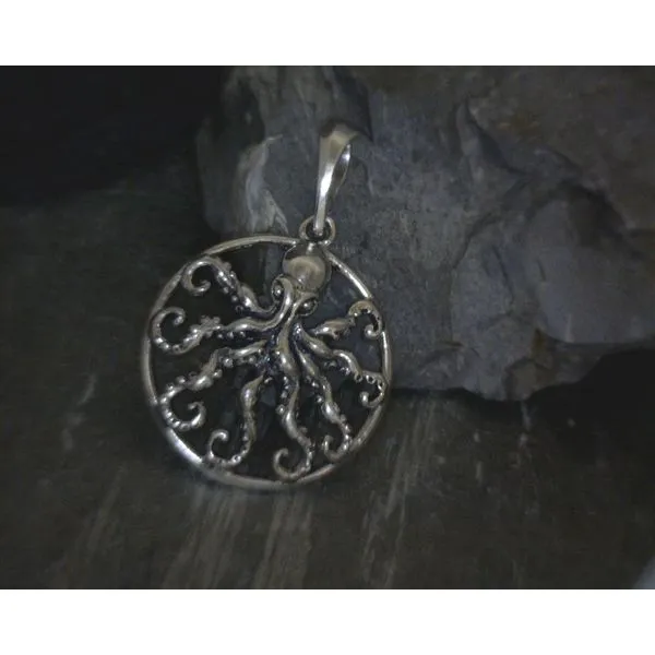 silver pendant  Vulcan's Forge LLC KANSAS CITY, MO