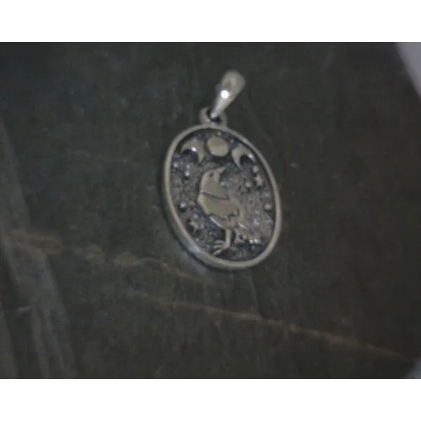silver pendant  Vulcan's Forge LLC KANSAS CITY, MO