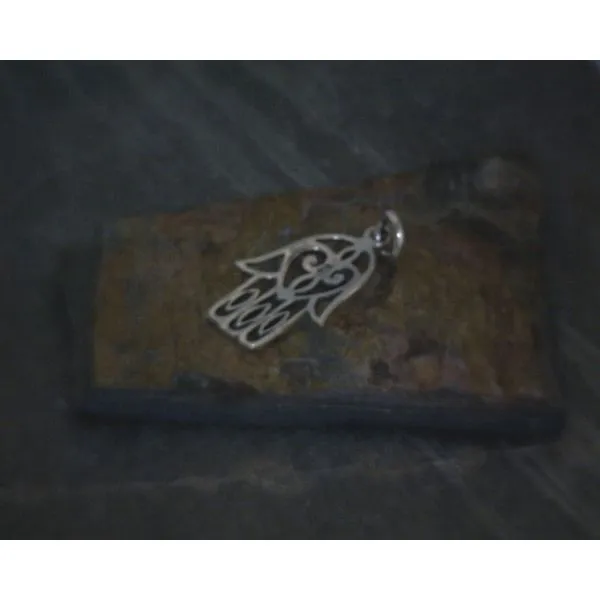silver pendant  Vulcan's Forge LLC KANSAS CITY, MO