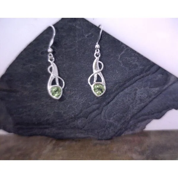 Off-trillion Peridot with Vine-like design Vulcan's Forge LLC KANSAS CITY, MO
