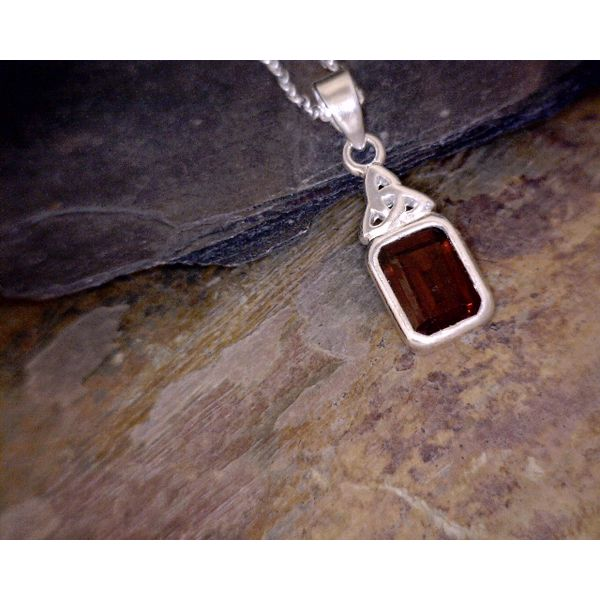 Small Rectangular Garnet with Celtic Accent on 16