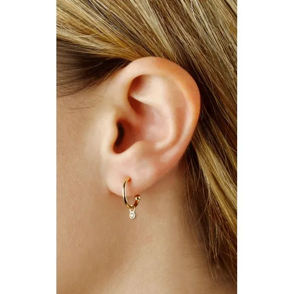 14K Yellow Gold 1.5mm Tube Hoop Earring with Bezel Set Diamond Charms and Snap Bar Closure Image 2 West and Company Auburn, NY
