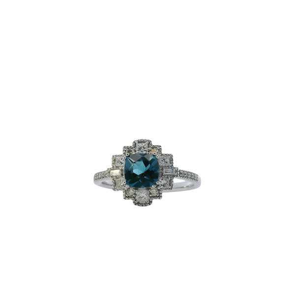 14K White Gold Cushion Cut London Blue Topaz Ring with Princess Cut, Baguette, and Round Diamond Accents and Milgrain Detail West and Company Auburn, NY