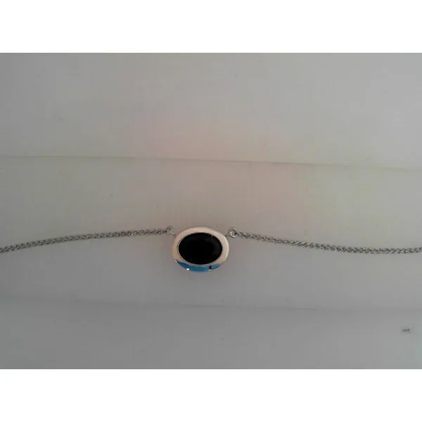 Midnight Blue Bezel Set Sapphire Necklace West and Company Auburn, NY