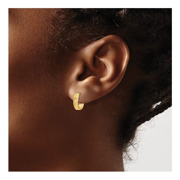 14K Yellow Gold Textured and Polished Huggy Hoop Earrings Image 2 West and Company Auburn, NY