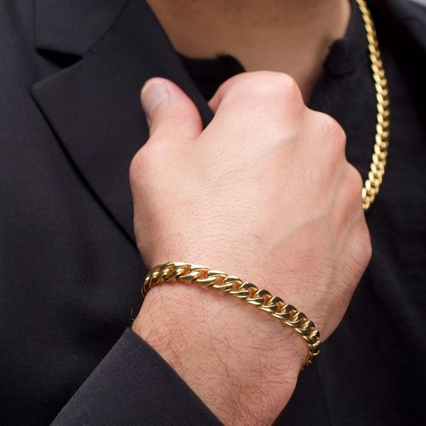 7.4mm 18KT Gold IP Titanium Curb Chain Bracelet with Lobster Clasp. 7.5 Inches in Length Image 2 West and Company Auburn, NY
