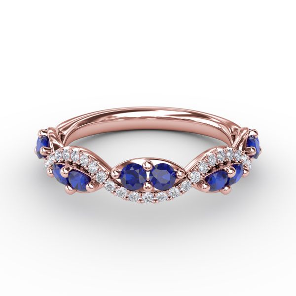 Sapphire and Diamond Twist Ring  D. Geller & Son Jewelers Atlanta, GA