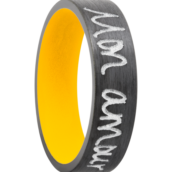 Zirconium 7mm flat band with slightly rounded edges and a laser-carved handwritten message with a yellow Cerakote sleeve Image 2 Saxons Fine Jewelers Bend, OR