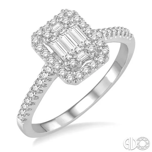 5/8 Ctw Emerald Shape Round Cut and Baguette Diamond Ring...