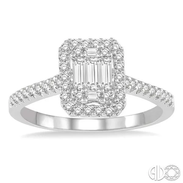 5/8 Ctw Emerald Shape Round Cut and Baguette Diamond Ring...