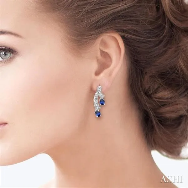 4x3MM Oval Cut Sapphire and 1/5 Ctw Round Cut Diamond Ear...