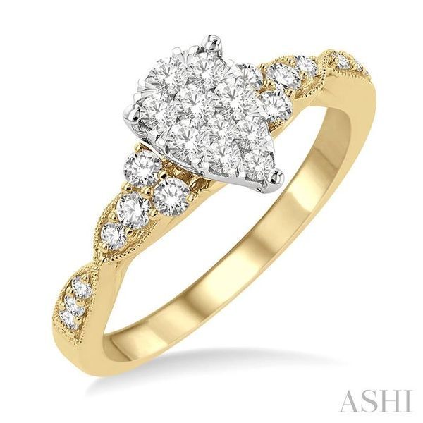 1/2 ctw Pear Shape Center Crisscross Carved Shank Lovebright Round Cut Diamond Engagement Ring in 14K Yellow and White gold Hart's Jewelers Grants Pass, OR
