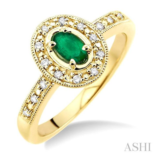 5x3mm Oval Shape Emerald and 1/10 Ctw Single Cut Diamond Ring in 14K Yellow Gold. Hart's Jewelers Grants Pass, OR
