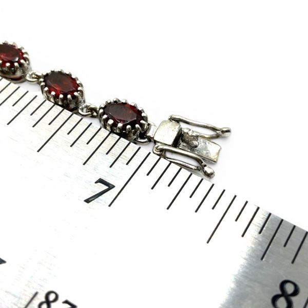 Sterling Silver Oval Brownish-Red Garnet Tennis Bracelet 7in