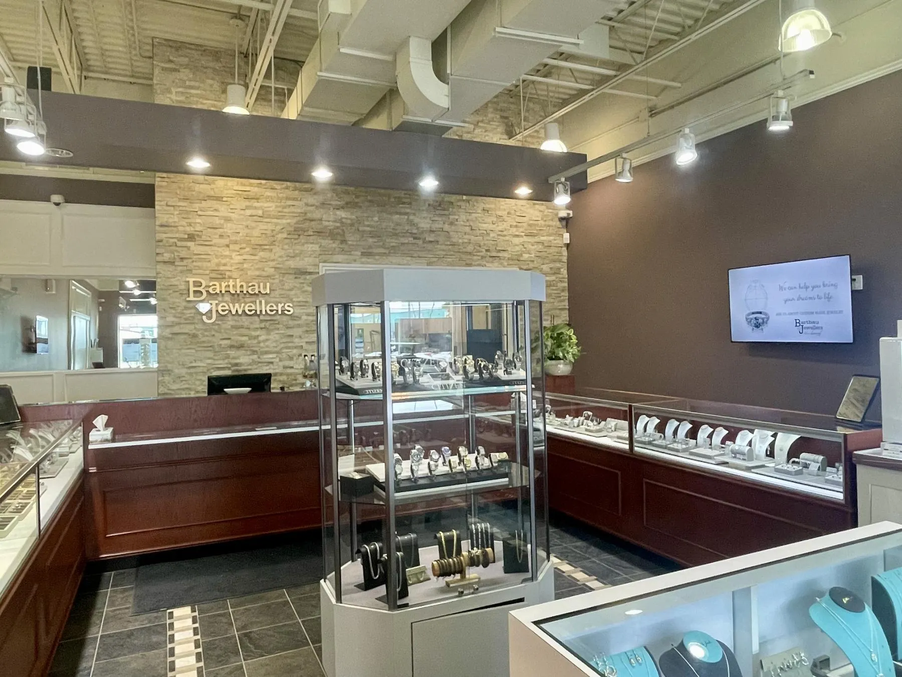Barthau Jewellers storefront with elegant displays of jewelry and a welcoming atmosphere in Stouffville. Click to explore!