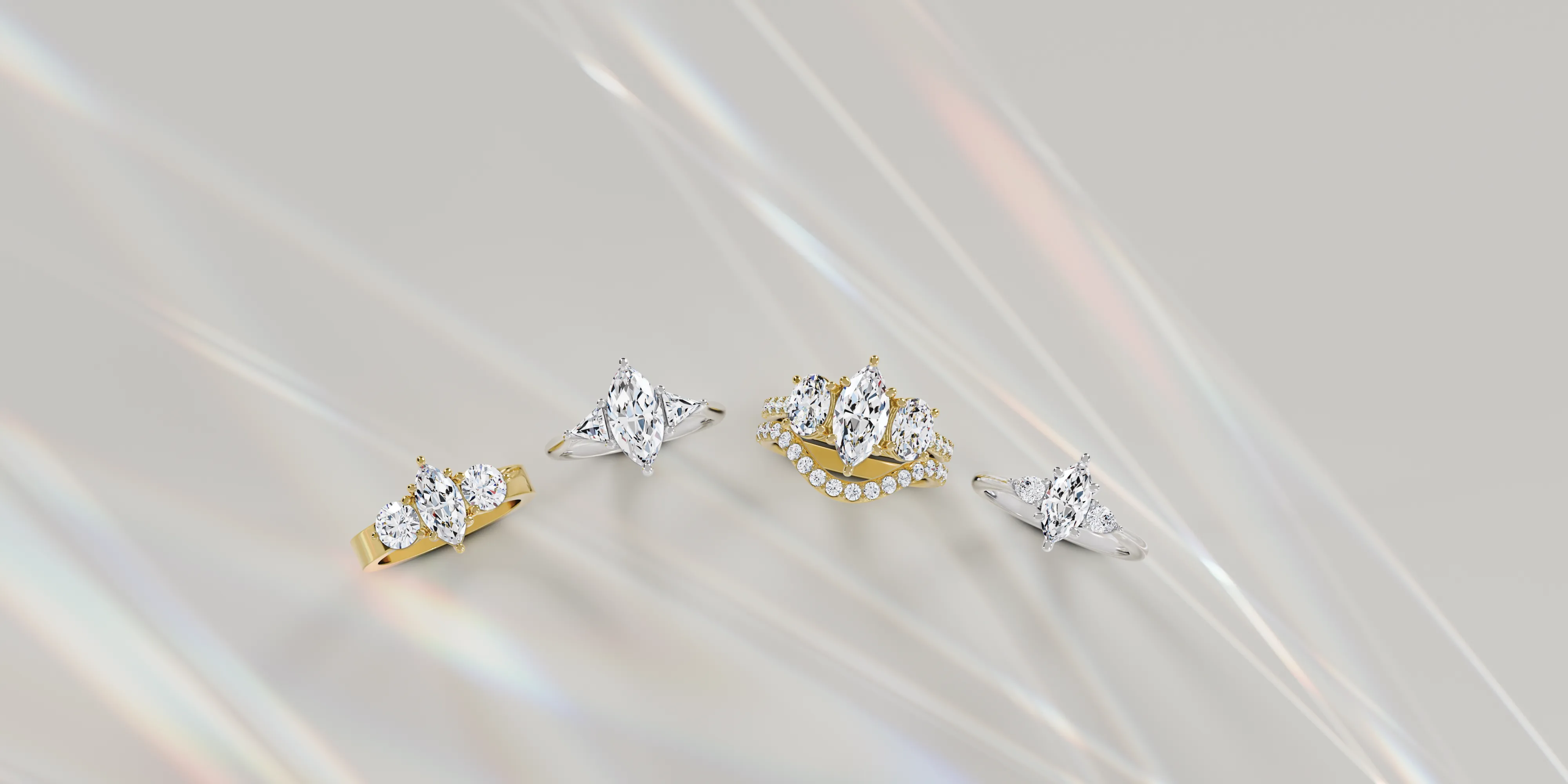 Elegant jewelry display featuring a diamond bracelet, gold and diamond earrings, and silver hoop earrings.