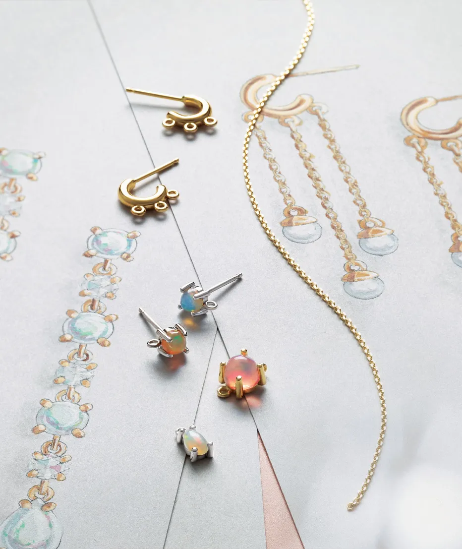 Elegant jewelry pieces including gold and silver earrings with opal stones, displayed on a sketch background.