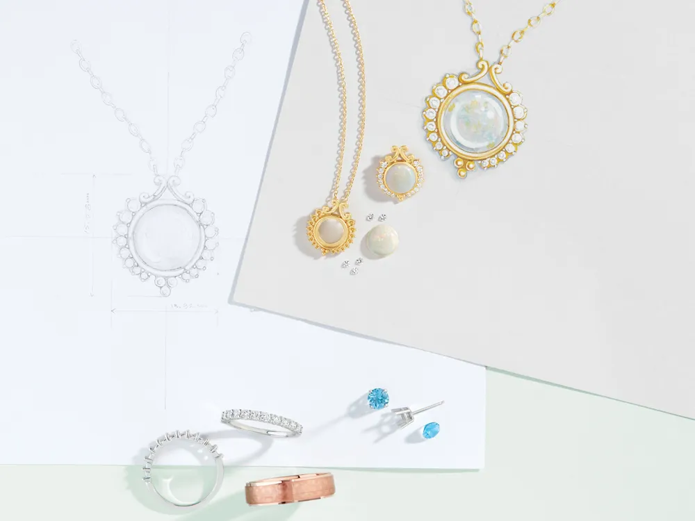 Jewelry sketches and designs featuring necklaces, rings, and earrings on a light background.