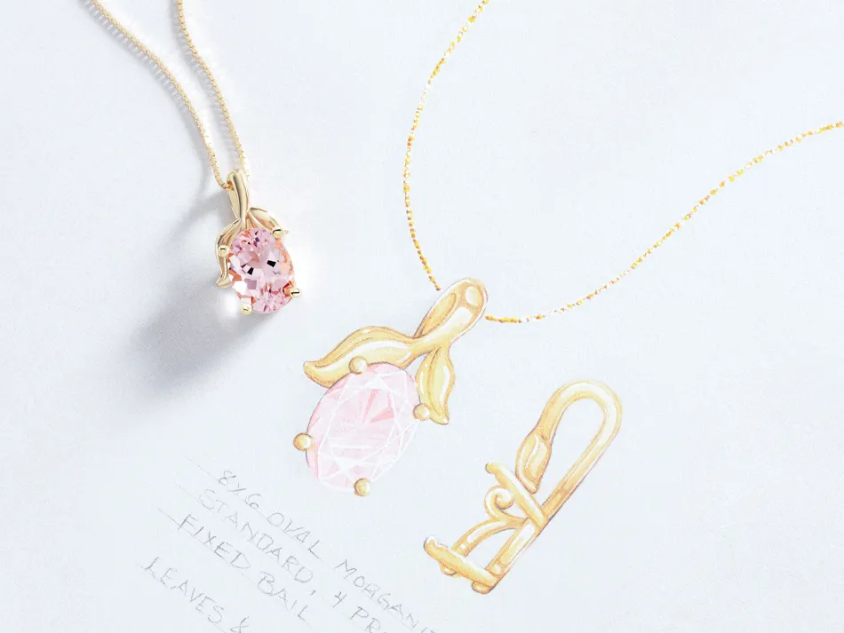 Pink gemstone pendant and gold bail design sketches on paper, showcasing jewelry design for Amos Jewelry in Wray.