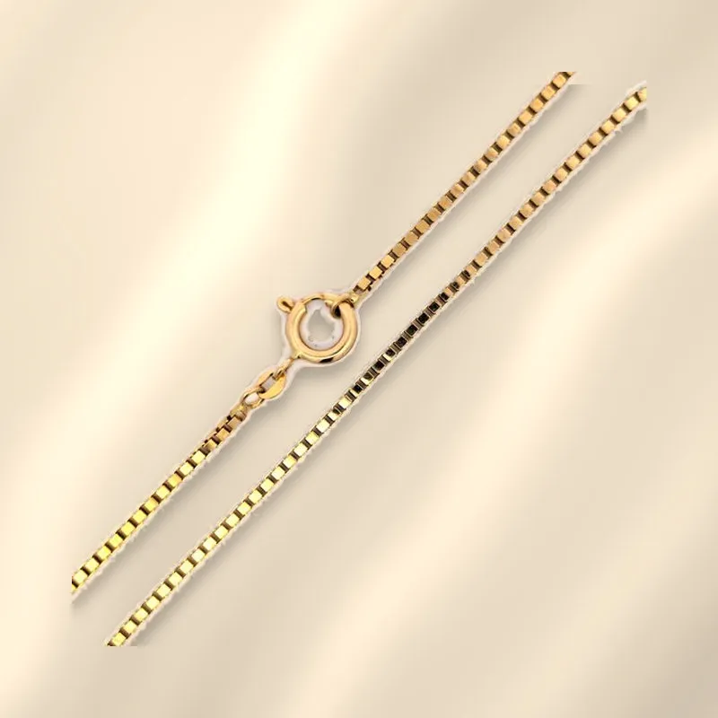 18K yellow gold 1.85 mm Italian box link chain, 24 inches, on champagne silk