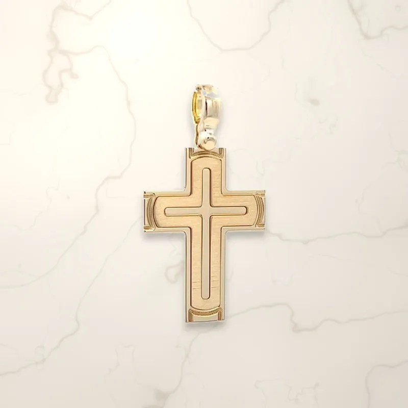 18K yellow gold fancy solid cross pendant, made in Italy, on cream marble