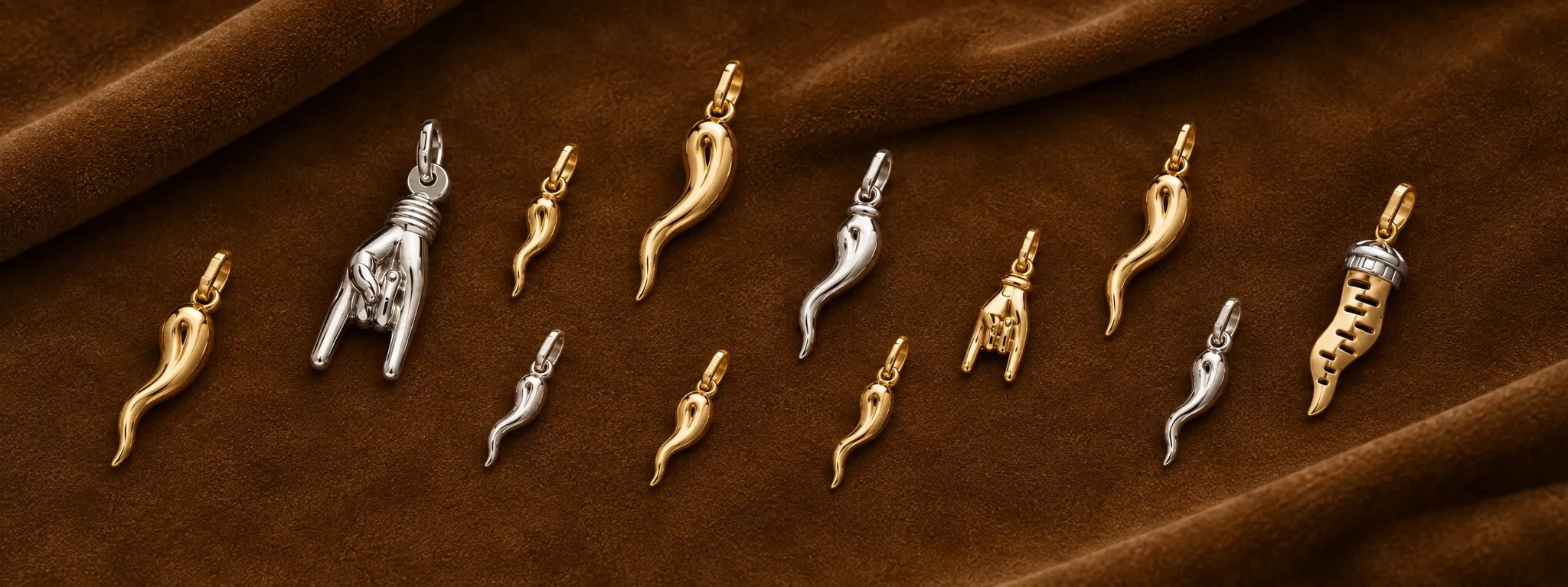 an assortment of italian gold horns and charms