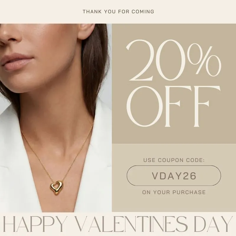 Woman wearing a heart-shaped necklace, promoting 20% off with coupon code VDAY26 for Valentine's Day at Arezzo Jewelers.