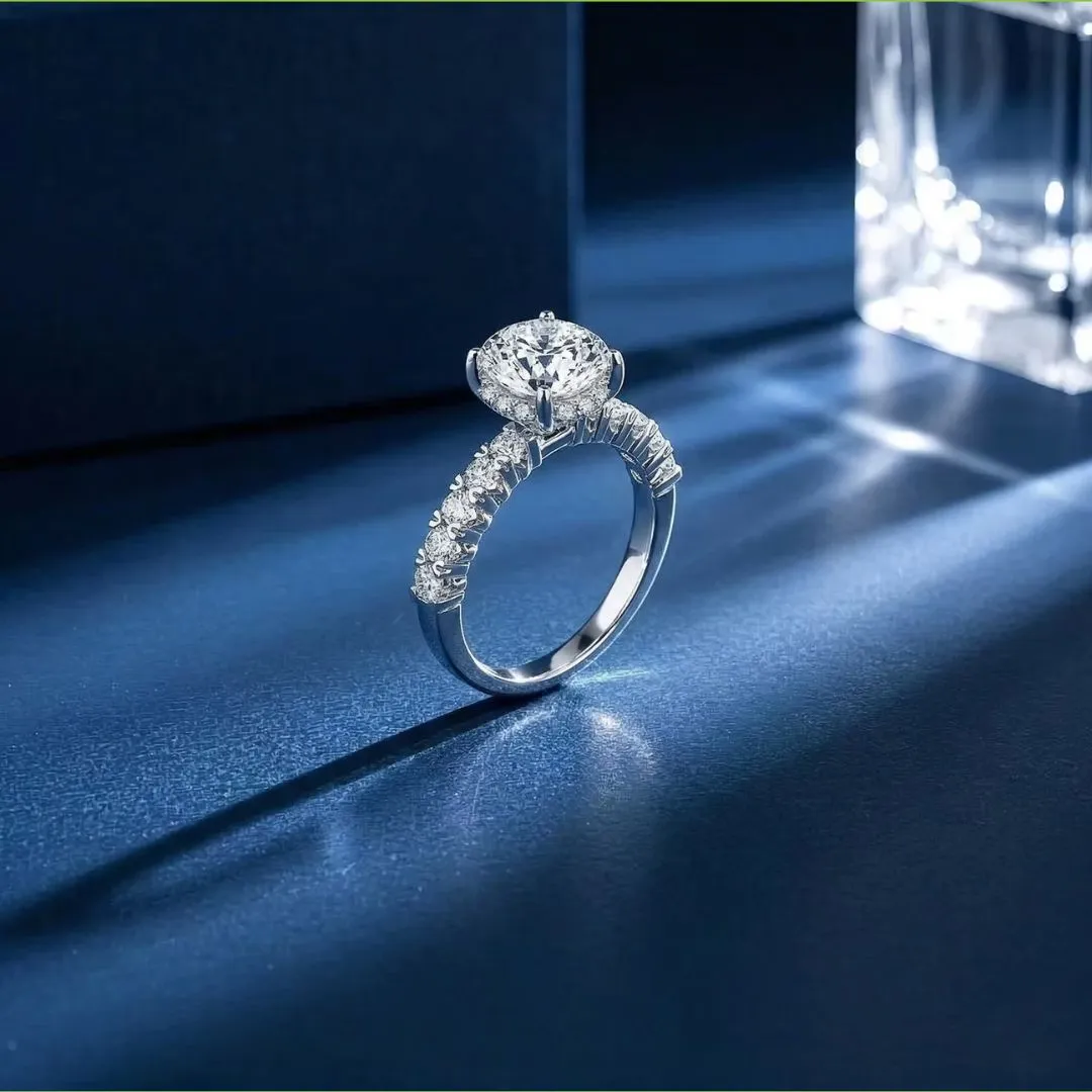 A diamond engagement ring with a large centurion diamond center stone and smaller stones on the band