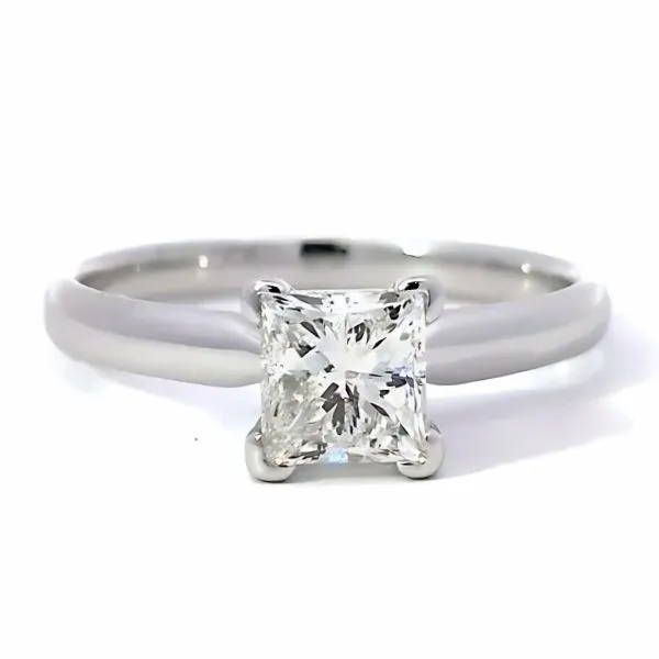 Classic solitaire engagement ring featuring a princess-cut diamond set in a sleek white gold band.