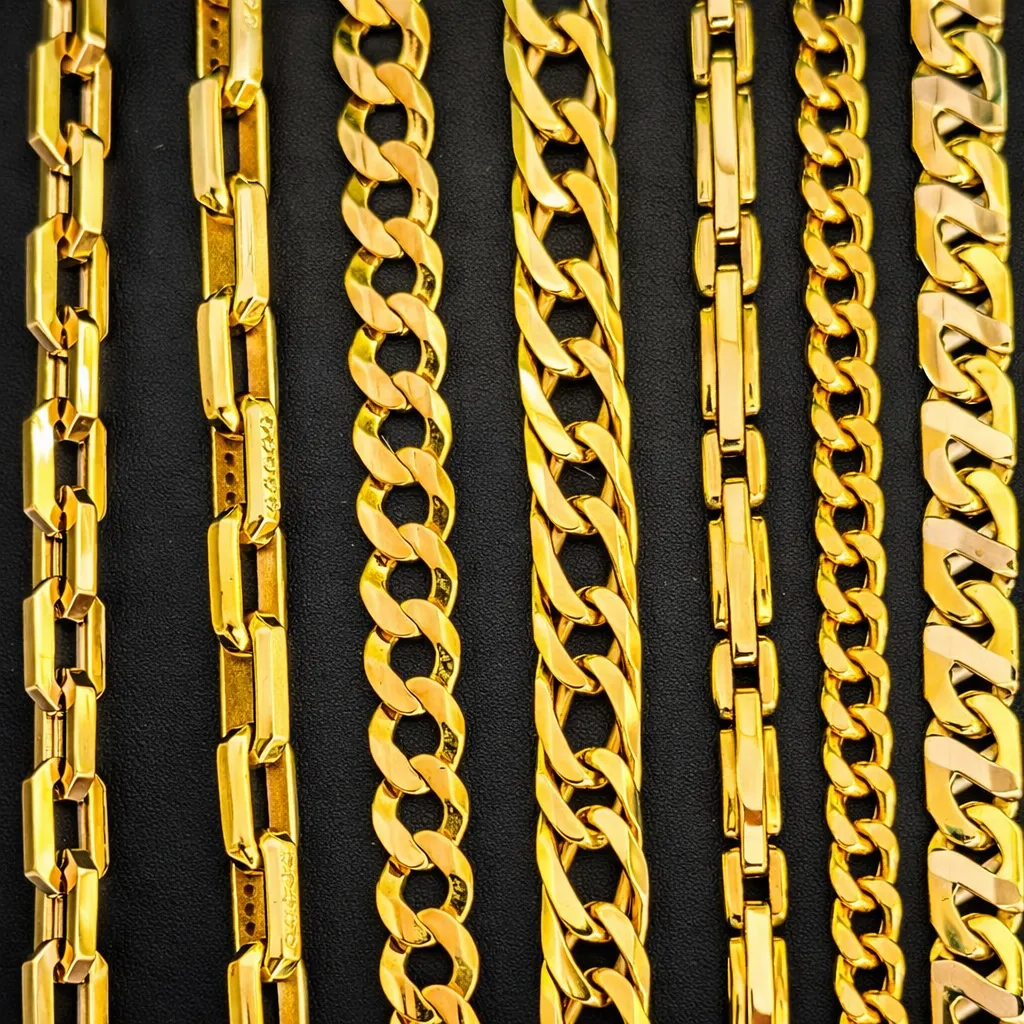 Elegant gold chains of varying styles displayed on a black background.