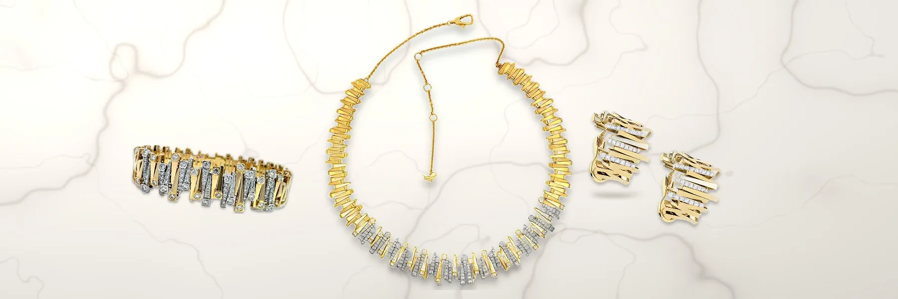 Savoia Arena diamond collar necklace, Arena earrings and Arena bracelet in 18K gold on white Carrara-style marble