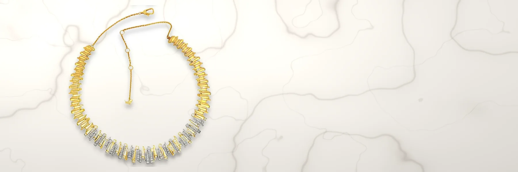 Savoia Arena collar necklace in 18K yellow and white gold with natural diamonds on white marble
