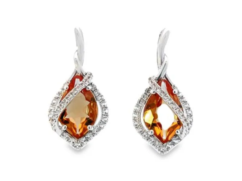 Lusterine Step into the light and see how the colors of these gemstones change! Depending on the setting, these stunning stones can display orange, pink, green, and more. Expect a surprise at every moment! Arthurs Jewelry Bedford, VA