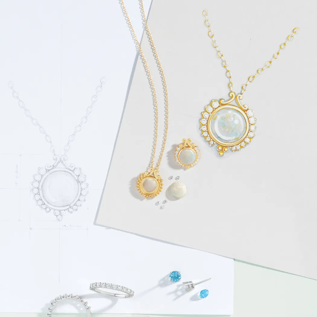 Gold jewelry pieces including a necklace, earrings, and a ring, alongside design sketches on a light background.