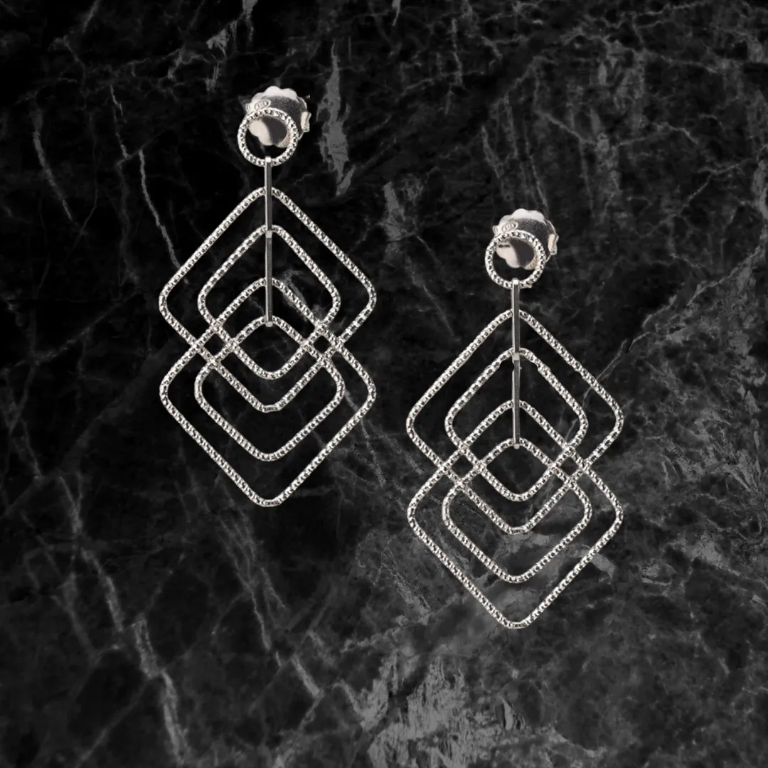Pretty silver earrings for your next formal event. Find them in Green Bay at Bay Area Diamond Company.