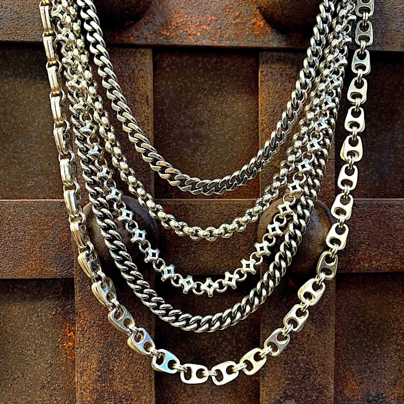 a few of the many masculine chains we have in store