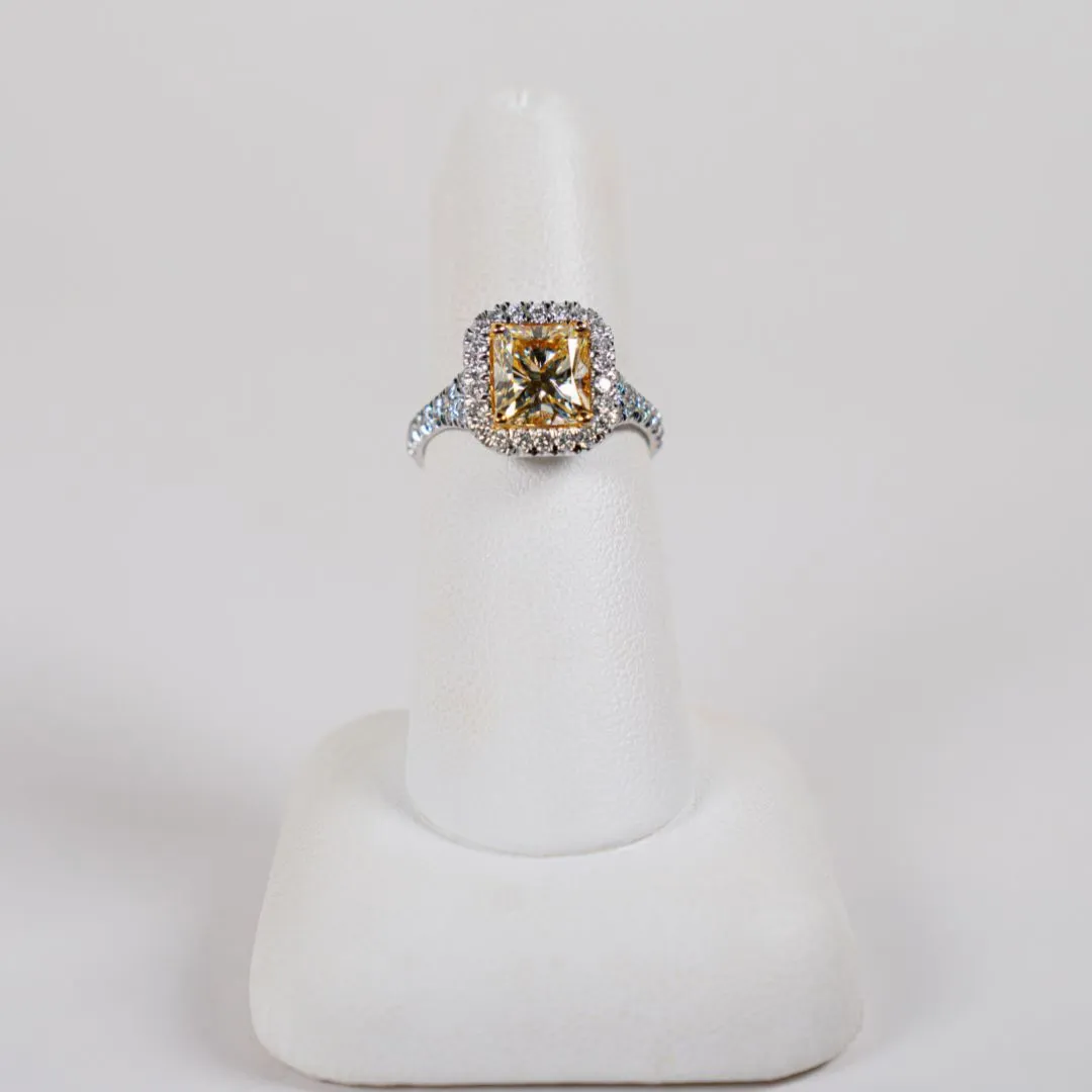  18 Karat White Gold Halo Fashion Ring with a 3.20 Carat Cut Cornered Rectangle Brilliant Shaped Center Diamond and 53 Round Accent Diamonds Bay Area Diamond Company Green Bay, WI
