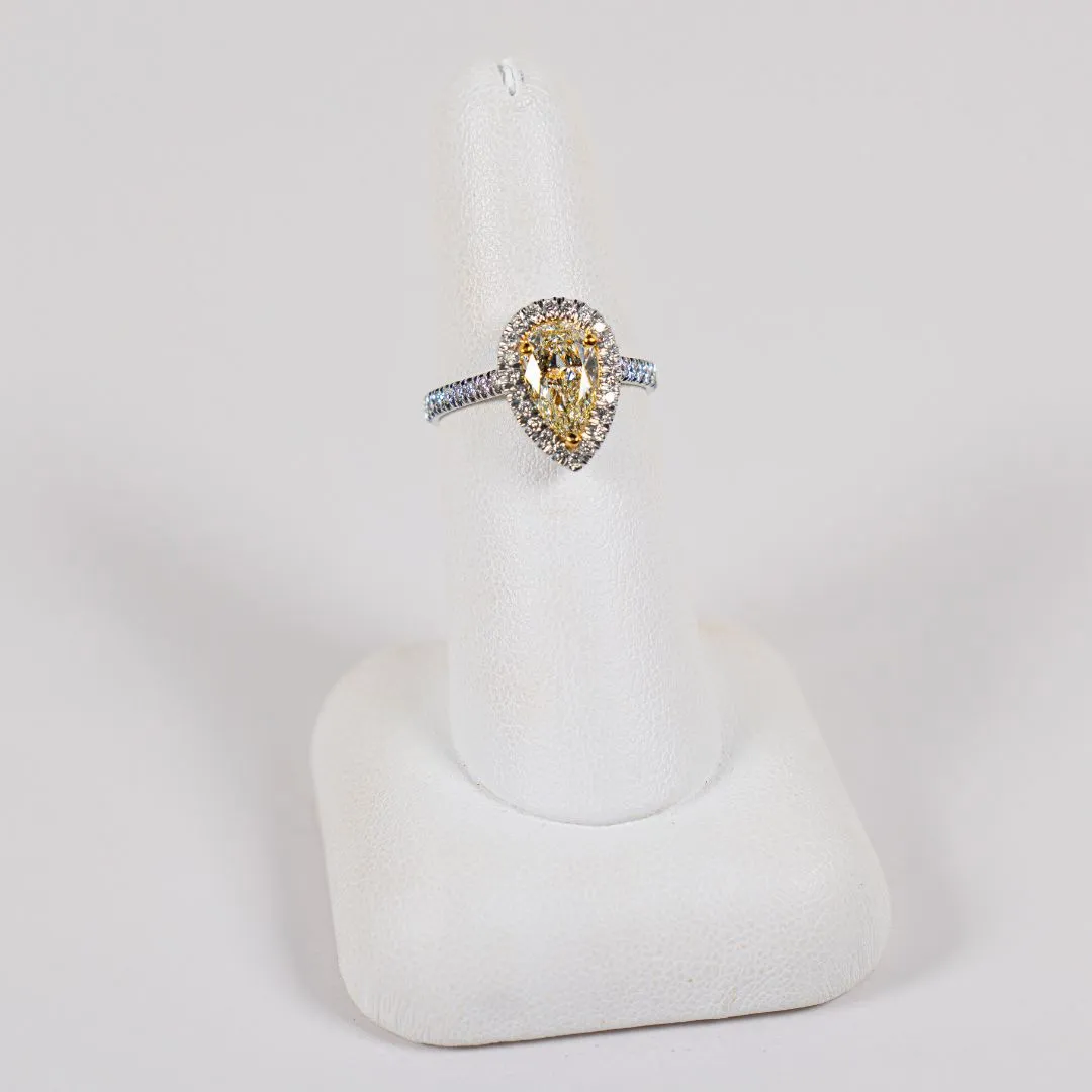  14 Karat White Gold Halo Fashion Ring with a 1.19 Carat Pear Brilliant Shaped Diamond and 41 Round Accent Diamonds Bay Area Diamond Company Green Bay, WI