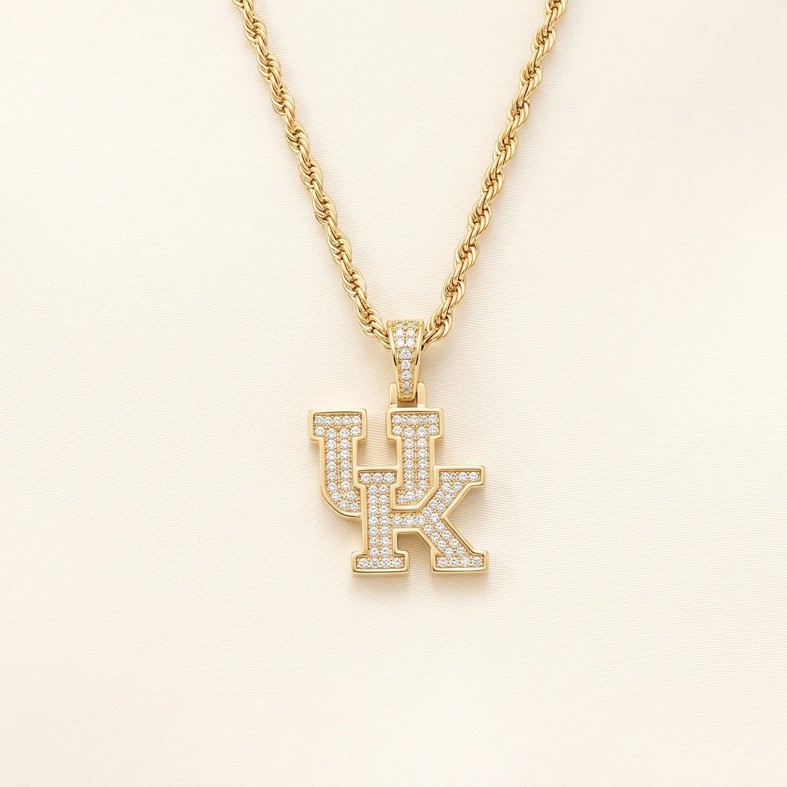 A gold necklace with a diamond-encrusted 