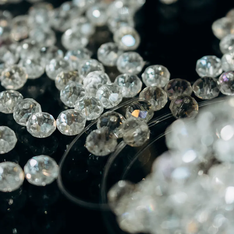 A loose parcel of round brilliant cut lab grown diamonds gathered together