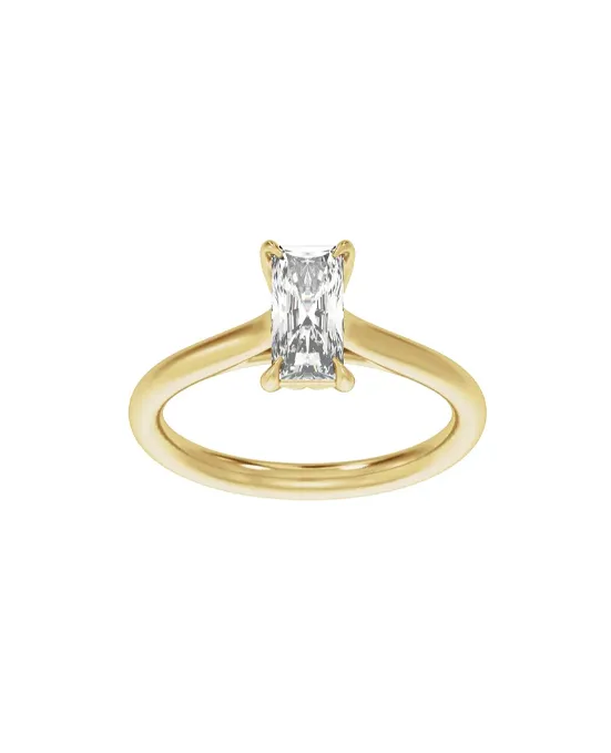 Elegant gold engagement ring featuring a rectangular diamond centerpiece.