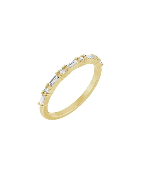 Elegant gold wedding band with diamond accents. Visit Bethany's Jewelry in Wellsboro for more details.