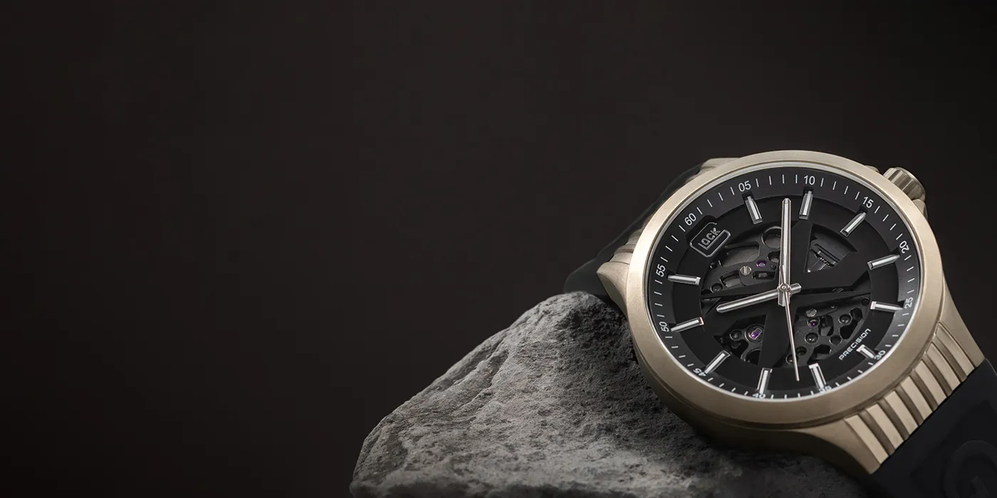 Glock watch on a stone, showcasing rugged design. Click to Shop Now at Bryan Jewelry in Prattville.