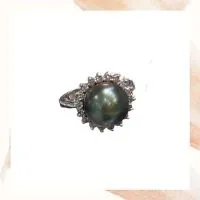 Item I – 14k white gold black Tahitian pearl and diamond ring