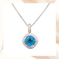 Item Q – 18k white gold blue topaz and diamond pendant, 16-inch